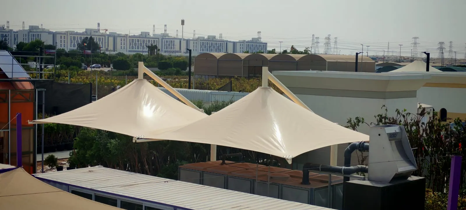 Conical tensile shades on a rooftop
